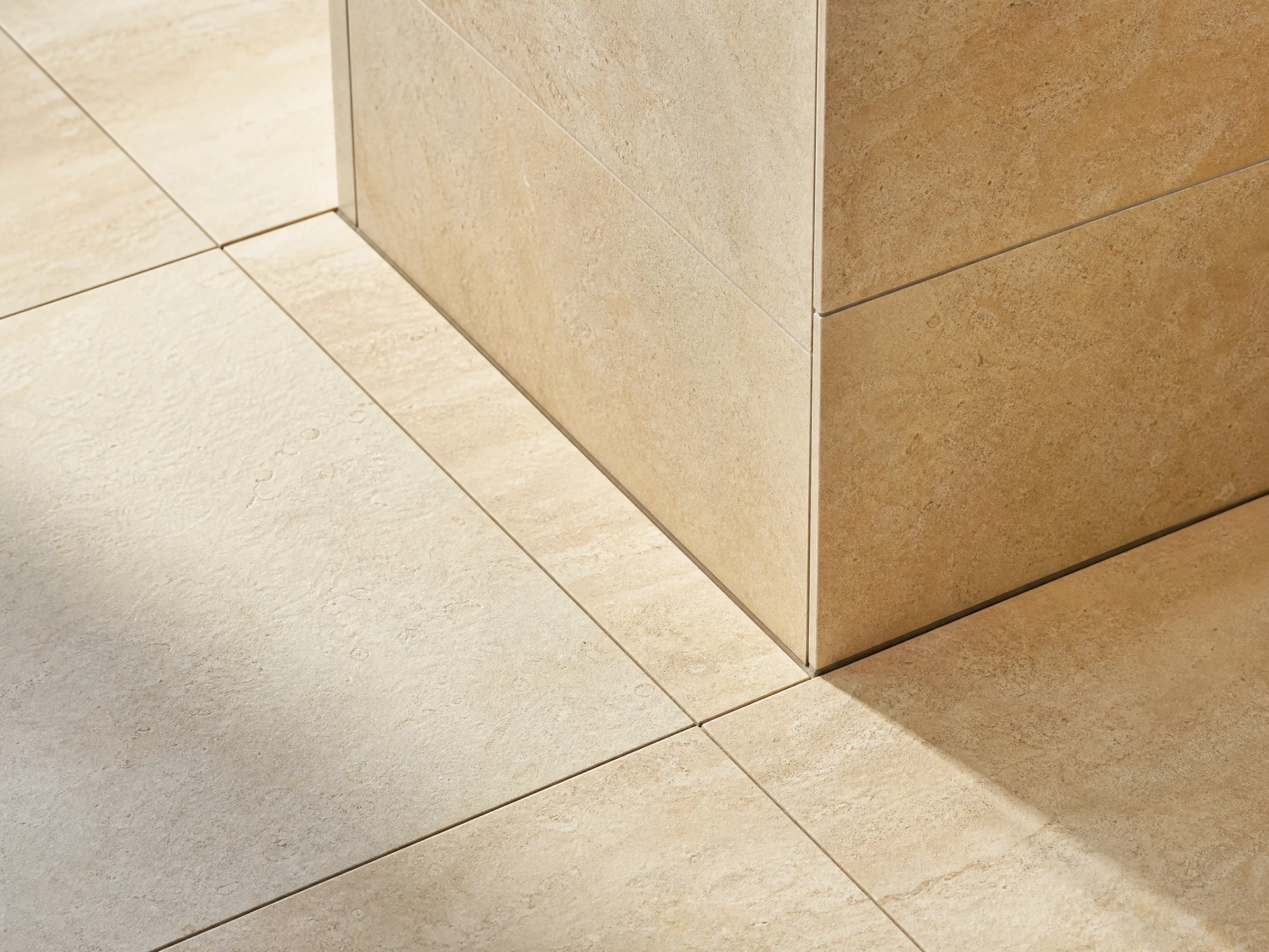 Close-up of precise porcelain tile alignment and finished grout lines